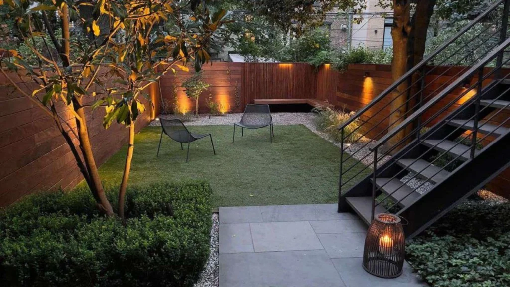 Beautiful outdoor landscaping with garden pathway, patio seating, and decorative lighting